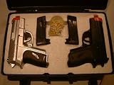 air soft sport gun`s comes with two guns in case,carrying case,6mm bullets,two clips.nice pistols.