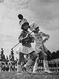 Drum Majors For All Girl High School Band Performing Artists Photographic Poster Print by John Phillips, 12x16