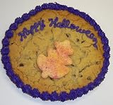 Scott's Cakes 1 lb. Chocolate Chip Cookie Cake with Leaf Cookie Purple Trim