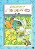 Young naturalist at the water's edge