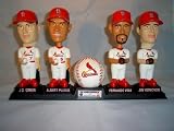 St Louis Cardinals Bobblehead set of 4 from 2002. Including Albert Pujols, Jim Edmonds, JD Drew and Fernando Vina. Autographed team ball and stand included too. 2002 McDonalds