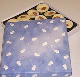 Scott's Cakes 1 lb. White Chocolate Almond Clusters in a Snowman Box