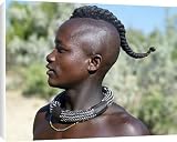 Canvas Prints of A Himba youth with his hair styled in a long plait, known as ondatu from AWL Discover Images