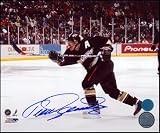 TEEMU SELANNE Anaheim Ducks SIGNED 8x10 Shooting Photo