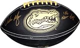 Urban Meyer Florida Gators Autographed Black Leather Football with 06 NAT CHAMPS Inscription