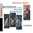 Sits in with the Oscar Peterson Trio