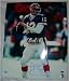 Jim Kelly Autographed/Hand Signed Buffalo Bills 8x10 Photo (blue jersey passing) with HOF 02 Inscrip