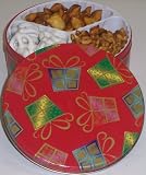 Scott's Cakes Yogurt Chocolate Pretzel, Sassy Peanuts, and Peanut Butter Pretzel Nuggets Combo in a Christmas Present Tin