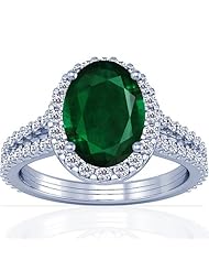 Platinum Oval Cut Emerald Ring With Sidestones