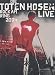 Der Headliner-Auftritt der Toten Hosen beim Rock-am-Ring-Festival 2004 war zwar schon bei MTV zu 
sehen, die DVD-Version wurde jedoch mit einem sehenswerten neuen Bildschnitt und drei Bonustracks 
aufgewertet. Hosen-Auftritte vor gro�em Publikum sind immer ein Erlebnis, und auch das 
Rock-am-Ring-Konzert ist ein Musterbeispiel f�r perfektes Interagieren zwischen Musikern und 
Publikum. Schon w�hrend des Ennio-Morricone-Intros The Man With The Harmonica toben 
Zehntausende von Fans, und bei den ersten Songs Hier kommt Alex, Du lebst nur 
einmal und Ausw�rtsspiel gibt es dann endg�ltig kein Halten mehr. 13- und 
30-J�hrige liegen sich singend in den Armen oder pogen friedlich um die Wette, w�hrend die 
D�sseldorfer Altpunks gewohnt spielfreudig einen Hit nach dem anderen auspacken. Von Sch�n 
sein �ber W�nsch dir was, Azzurro, Madelaine (aus 
L�denscheid), Bayern, Zehn kleine J�germeister und Bis zum 
bitteren Ende bis hin zu Opel-Gang und Eisgek�hlter Bommerlunder wird 
alles aufgefahren, was die Hosen zur neben den �rzten gr��ten deutschen Punkband gemacht hat, und 
mit Alles wird vor�bergehen sowie den Coverversionen Song 2 (Blur) und 
Mad World (Michael Andrews/Gary Jules) gibt es drei Lieder zu sehen, die in der 
MTV-�bertragung nicht gezeigt wurden. Campino ist zwar streckenweise etwas schlecht bei Stimme und 
nervt mit einigen arg platten Politansagen, treibt seine schwitzenden Nebenleute ansonsten aber 
immer wieder zu H�chstleistungen an und klettert bis hinauf aufs B�hnendach, um den Fans 
einzuheizen. Die Tonspuren wurden sympathischerweise nicht nachbearbeitet, sprich man kommt in den 
Genuss der Originalaufnahmen ohne stimmungst�tende Overdubs. F�r die Bildregie verpflichteten die 
Hosen hingegen den Briten Paul Shyvers, der als eine der Top-Gr��en seines Metiers gilt und schon 
f�r Bands wie Coldplay und die Red Hot Chili Peppers gearbeitet hat. Er veredelte die Optik des 
Konzerts zu einem eindrucksvollen Kunstwerk, das ohne aufdringliche Effekte die B�hnen-Ausstrahlung 
der Hosen und die Begeisterung des Publikums exzellent herausstellt und den Zuschauer vor dem 
Fernsehschirm mitten hinein in den feiernden Pulk auf dem N�rburgring katapultiert. Bild (16:9) und 
Ton sind von allerh�chster Qualit�t, wobei sich der Sound nicht nur in Dolby Digital 2.0 und 5.1, 
sondern auch im dts-Format ins heimische Wohnzimmer holen l�sst. Neben dem zweist�ndigen Konzert 
enth�lt die DVD noch ein halbst�ndiges Behind-the-scenes-Special, in dem man Zeuge des geheimen 
Aufw�rmgigs der Hosen auf einem Lkw-Anh�nger am Eingang des Zeltgel�ndes wird, Einblicke in den 
Backstage-Bereich des Festivals erh�lt und sich Alles wird vor�bergehen aus einer 
anderen Perspektive ansehen kann.-- Michael Rensen