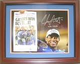 Chris Leak signed 16x20 Photograph holding a Commemorative Newspaper after the 2006 BCS Championship Game