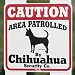 Sign "Caution Area Patrolled By Chihuahua Security Co"