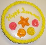 Gourmet Food : Cookie Cake Pie with Almond Cookie and Vanilla Cake 9'-Topped with Mixed Fruit Sea Shell and Starfish Gummies