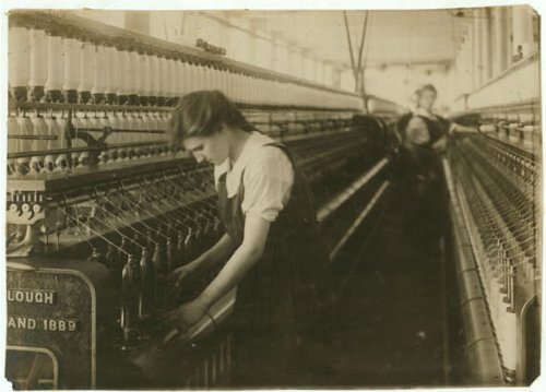 Photo King Philip Mill - Card Room. Doffer on Jack Speeder. Bertha Bonneau, 15 years, 105 Slade St. Location: Fall