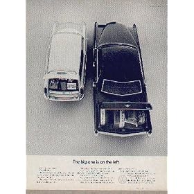 The big one is on the left. Don't rub your eyes. It's no illusion. The Volkswagen Squareback on the left actually has more luggage space than the Caddy on the right. The back of the Caddy has 22.2 cubic feet of loading space. The back of our Squareback has 24.7. And if you need even more room than that you can fold down the rear seat. There's 17.7 more cubic feet. And when you've finished loading up our back, you can start loading up our front. Because where most cars have an engine, we have a trunk. That's 6.5 more cubic feet for us. ..... 1969 Volkswagen of America Ad, A5067.