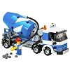 LEGO-man putting cement on the ground using the cement-pipe