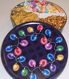 Scott's Cakes Taffy, Peanut and Pretzel Brittle, and Sassy Peanut Combo in a Christmas Lights Tin