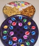 Scott's Cakes Taffy, Peanut Brittle, and Sassy Peanut Combo in a Christmas Lights Tin