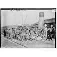 Photo (L): Marines debark