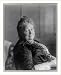 Historic Print (L): [Amelia E. Barr, half-length portrait, seated]