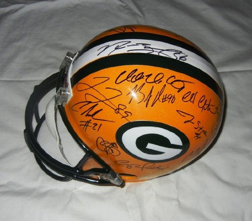 2010-11 Green Bay Packers Team Signed Full Size Helmet W/PROOF, Picture of The Players Signing For Us, Super Bowl XLV Champions, Aaaron Rodgers, Charles Woodson, James Starks, Mike McCarthy, Donald Driver, Greg Jennings, Clay Matthews, And Many More