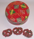 Scott's Cakes 1 lb. White Chocolate Covered Pretzel with Christmas Jimmies in a Christmas Present Tin