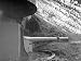 American Soldier Standing Guard Duty Near Coastal Gun Emplacement, Hidden by Camoufla...