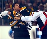 Option #1: Great shot of Milan Lucic fighting Matt Bradley of the Washington Capitals at TD Banknorth Garden - 8"x10" Photo with Clear Protective Sleeve