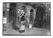 Historic Print (L): Tired woman with heavy load of home-work. Lafayette St., near Ast...