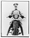 Historic Print (L): [T.E. Lawrence, three-quarter length portrait, seated on motorcycle, in uniform, facing
