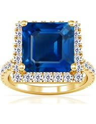 14K Yellow Gold Emerald Cut Blue Sapphire Ring With Sidestones
