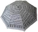 White and Black Umbrella with Piano Keyboard and Sheet Music