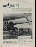 Airlift - An airborne loads jeep and trailer into a USAF C-119 