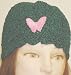 Hand Crocheted Forest Green Color Chenille and Gimp Tweed Skull Cap for Women and Teens Trimmed with One Fuchsia Color Rhinestone Velvet Butterfly