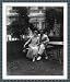 Historic Print (S): [Mary Pickford and Douglas Fairbanks seated together on a bench at a table outdoors]