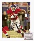 Brandon Jacobs New York Giants Autographed 8 x 10 Red Jersey Rushing Photograph with #27 Inscri