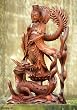 Wood sculpture, 'Kwan Im and the Dragon' Wood sculpture, 'Kwan Im and the Dragon'