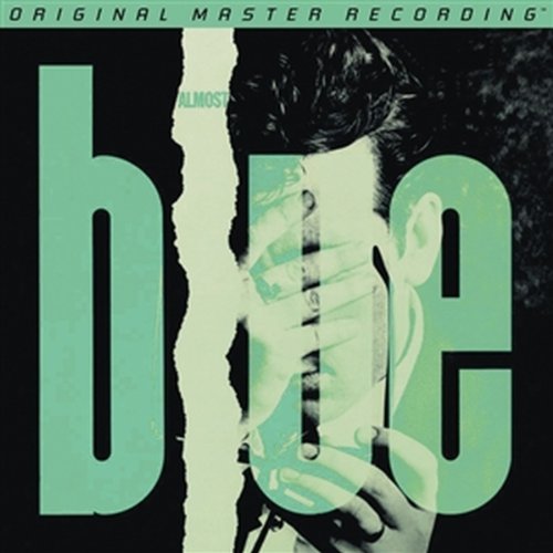 Elvis Costello & The Attractions - Sittin