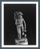 Historic Print (L): [Wood sculpture by Joaquin Aguilar Guzman of a mat seller, carrying bundle on his back]