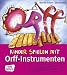 Kinder spielen mit Orff-Instru