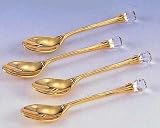 SET OF FOUR GOLD PLATED SPOONS WITH CRYSTAL TIPS
