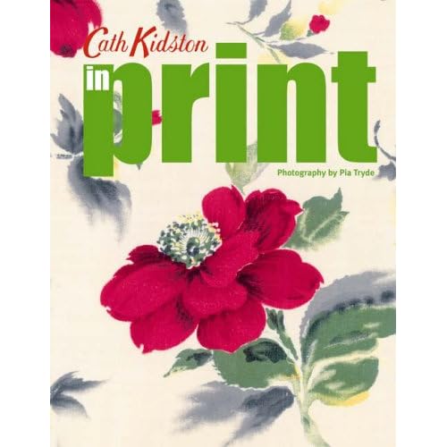 Cath Kidstons In Print: Brilliant Ideas for Using Vintage Fabrics in Your Home I found this in the $2 bin at Chapters!
