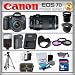 Canon EOS 7D 18MP - Canon EF 70-300mm f/4-5.6 IS USM - Canon EF 28-135mm f/3.5-5.6 - Wide Angle and Telephoto Zoom Lenses - 16GB Memory Card - USB Card Reader - 1 Spare Battery - Digital Flash - Tulip Lens Hood - 3 Piece Lens Filter Kit - Carrying Case - Screen Protector - Lens Cleaning Kit - Full Size Tripod