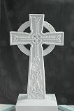 Headstone: Celtic Cross (also known as) the Black Falcon Cross. 34 inches high and made out of Irish limestone.