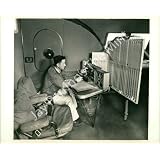 Vintage Photo- Man working with airplane instruments