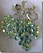 Silver Bow Pin With Green Crystals B1R33