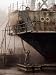 Sandblasters Restore a Soviet Ship at This Shipyard Photographic Poster Print by Cotton Coulson, 48x