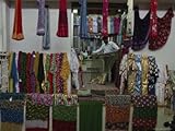 IMAGE OF Textiles on Display in the Mutrah Suq, or Market Stretched Canvas Poster Print by James L. Stanfield, 18x24