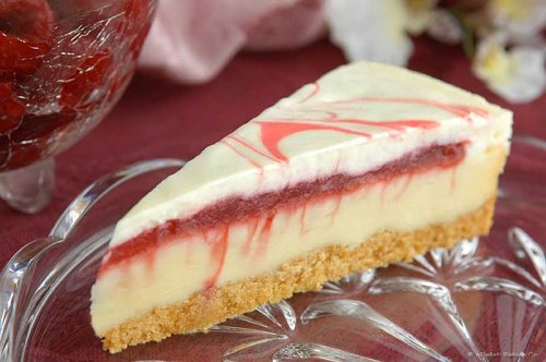 Raspberry White Chocolate Cheesecake by oDelish Baking Company