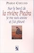 Sur le bord de la rivi�re Piedra, je me suis assise et j'ai pleur�